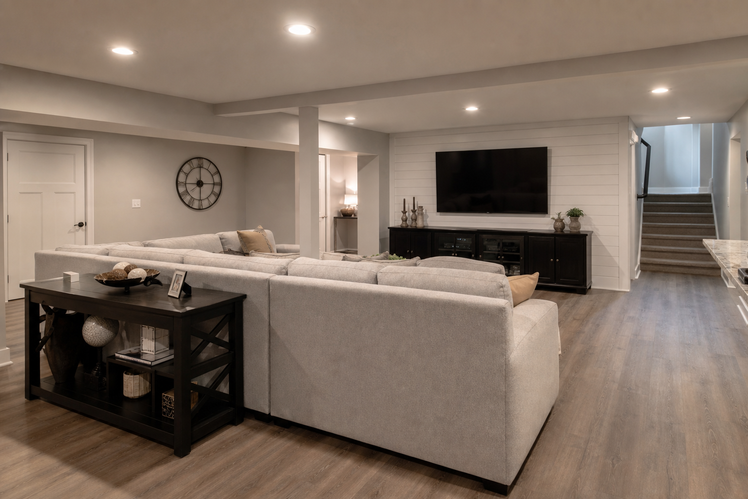 Finished basement in Chester County PA home with egress window and recessed lighting