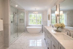 Bathroom remodeling Malvern PA — elegant master bathroom with soaker tub and double vanity by Harlan Contracting